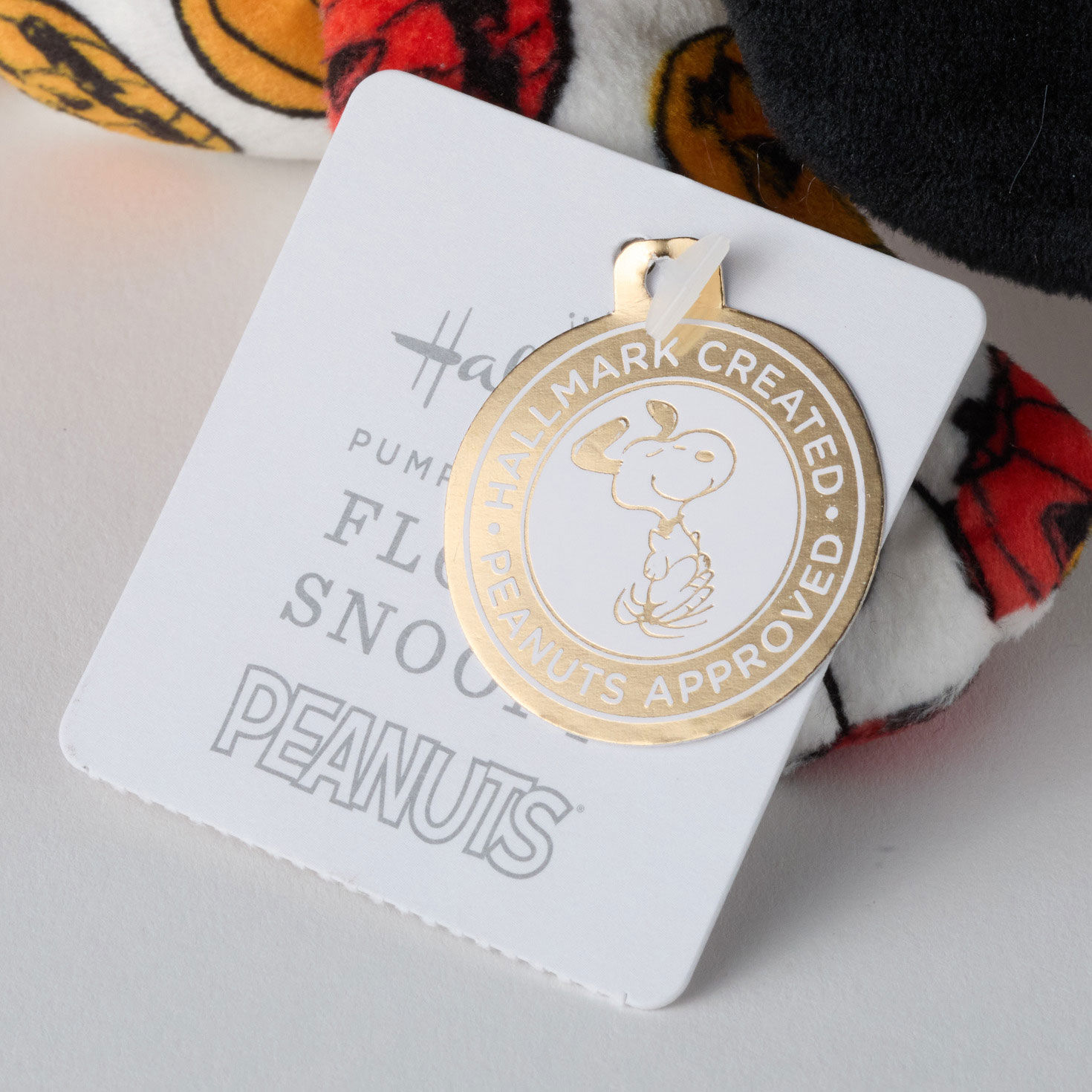 Peanuts&reg; Jack-o'-Lanterns Floppy Snoopy Plush package tag image number 5