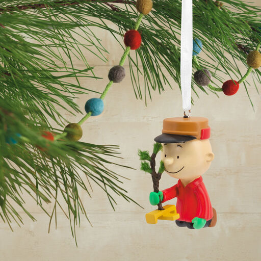 Peanuts® Charlie Brown Kneeling With Tree Hallmark Ornament, 