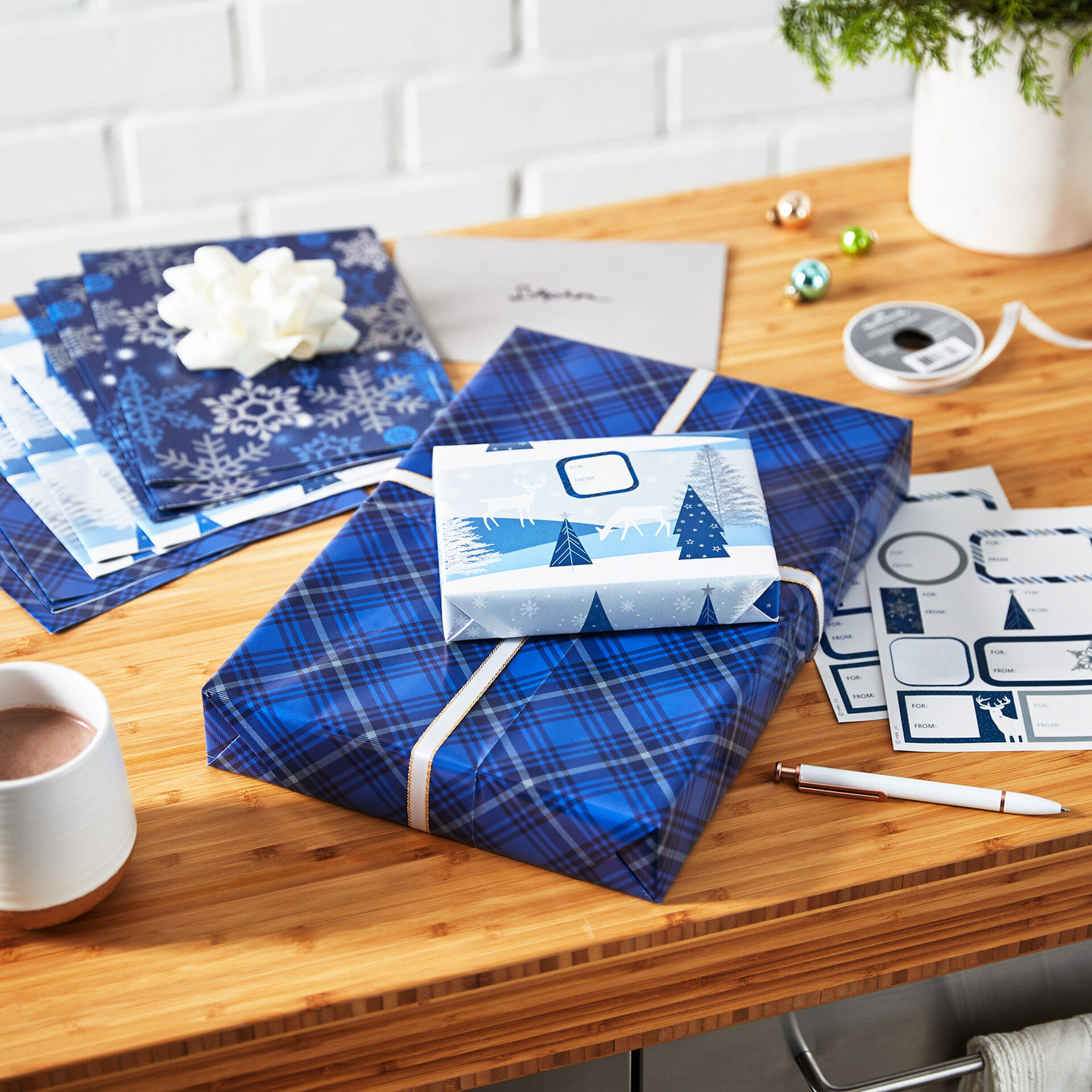 Blue Wrapping Paper
 Wintry Blue Assorted Flat Wrapping Paper With Gift Tags 12 sheets