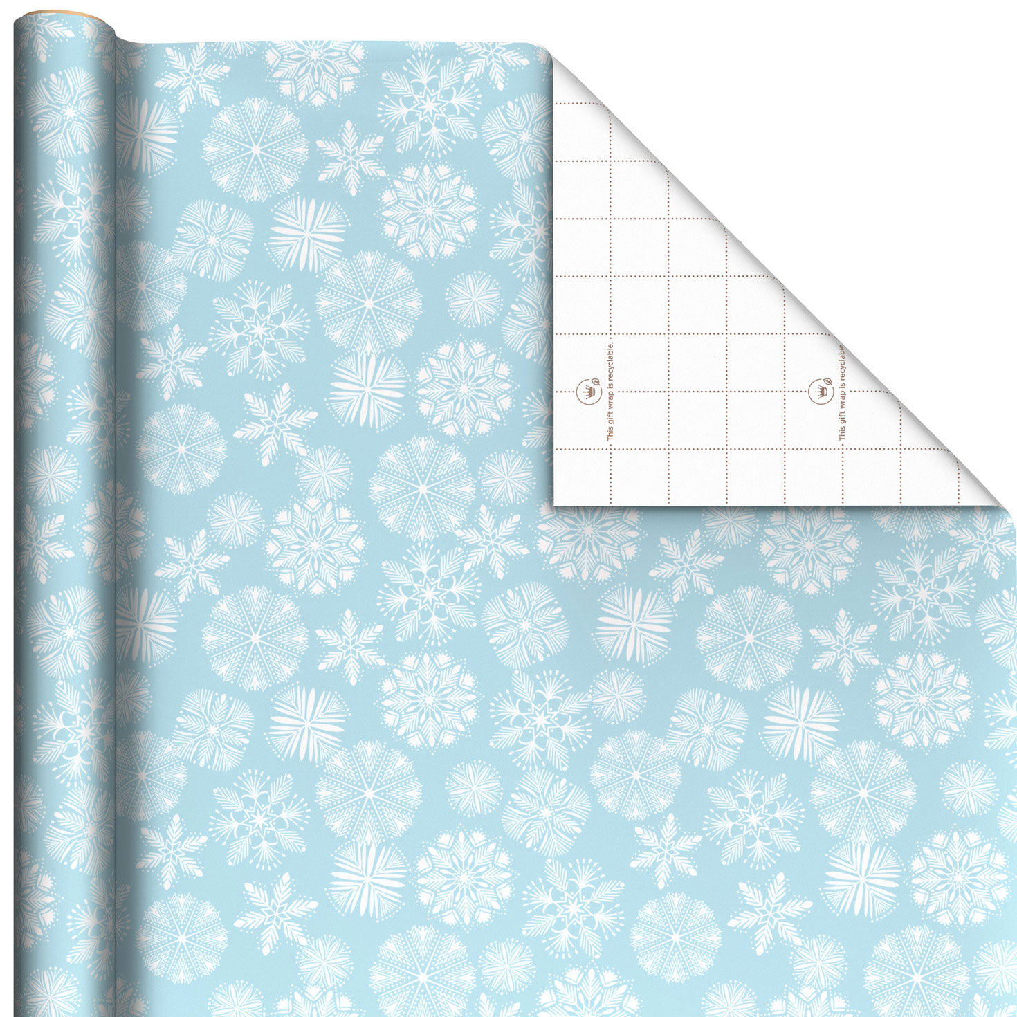 A roll of blue wrapping paper with white snowflakes on it
