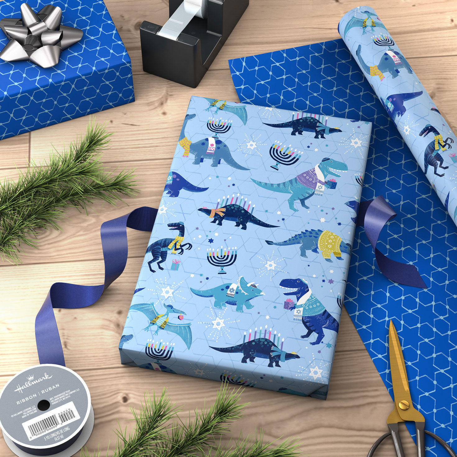 Dinosaurs and Stars Reversible Hanukkah Gift Wrap Wrapped package image number 3