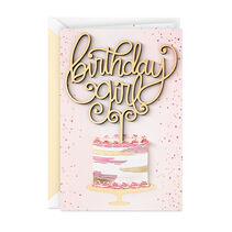 Pink card with birthday cake and script gold lettering reading Birthday Girl