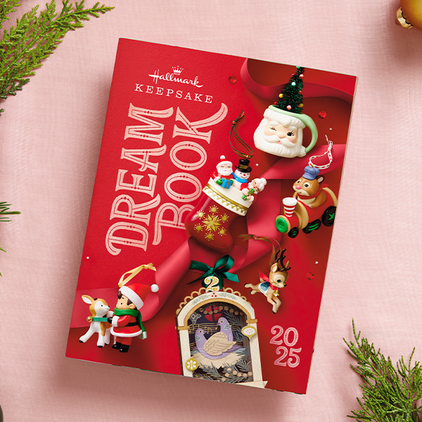 2025 Dream Book on pink background.