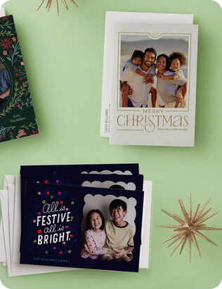 Two photo Christmas card designs on a green background