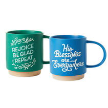 Two mugs with religious quotes on them