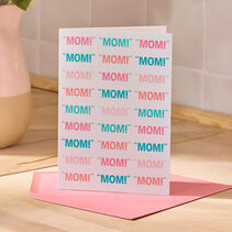 Card with “Mom!” repeated over and over on the front.