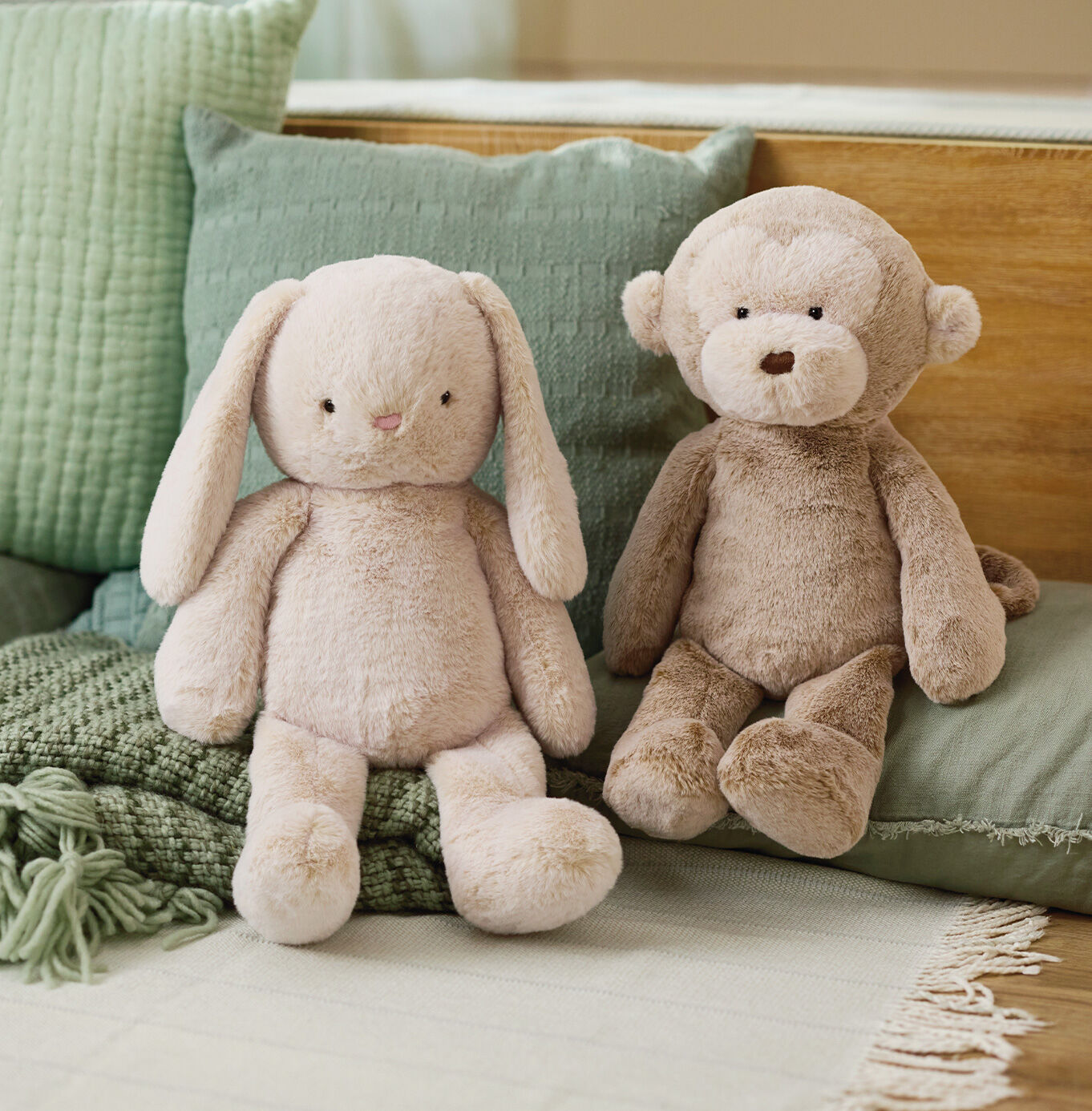 Monkey and rabbit stuffed animals. 
