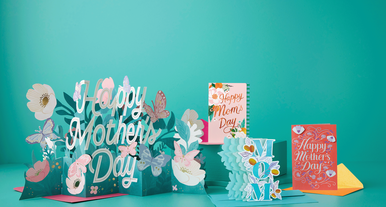 Assorted Mother’s Day cards on teal background