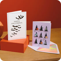 Two Halloween cards on a table