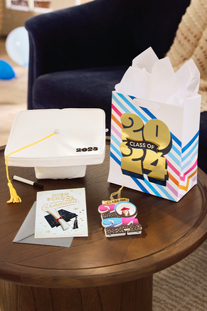 Gifts for a graduate on a table