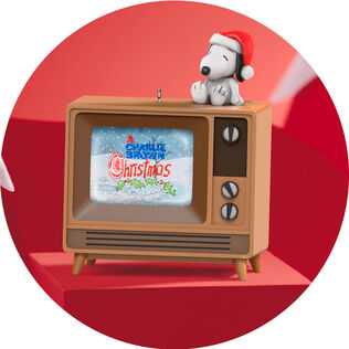 Vintage television with Peanuts Christmas special on screen ornament
