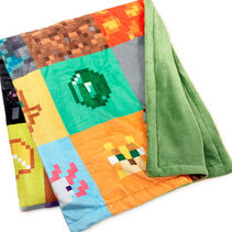 Two-sided blanket with Minecraft patterns on the front