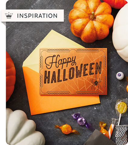 Halloween card with Happy Halloween' and a spider hanging off a letter.