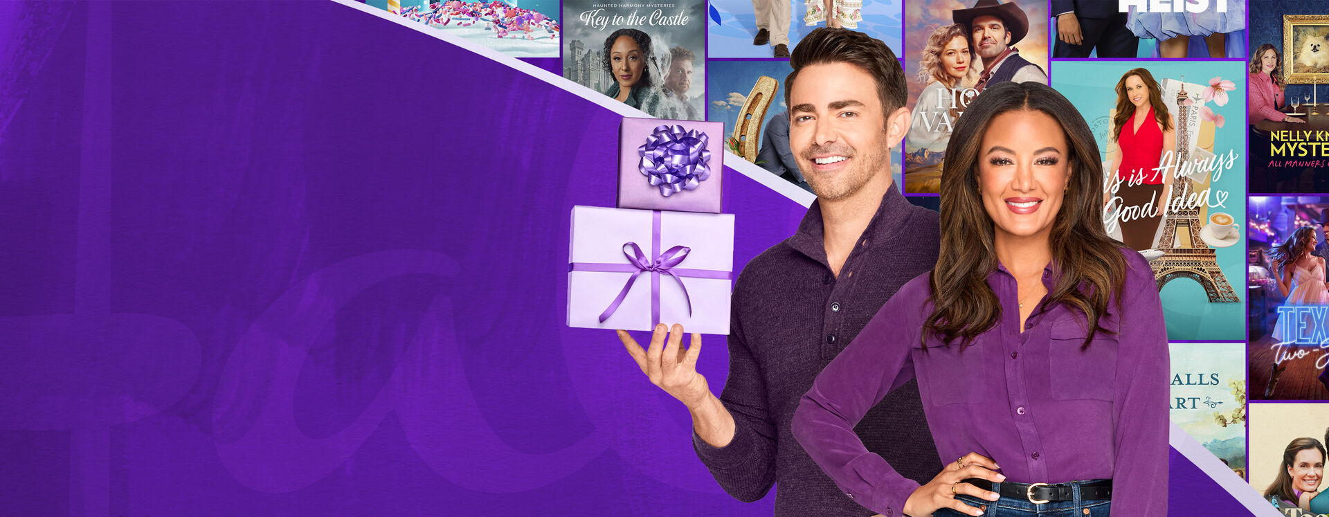 Hallmark stars standing in front of Hallmark movie posters