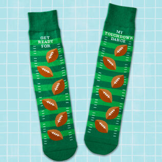 Socks with gridiron and football pattern with “Get ready for” and “My touchdown dance” on the back of each