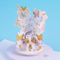 Pop-up card with lavender and gold butterfly and flower designs.