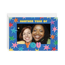 Blue card with rainbow starbursts surrounding a personalized photo with the text Another year of you' in bubble letter
