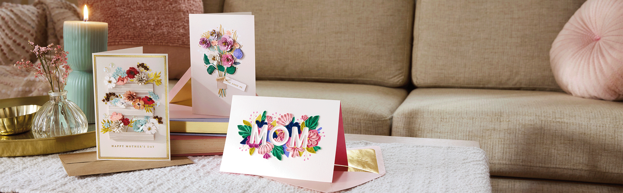 Three Mother’s Day cards on an ottoman