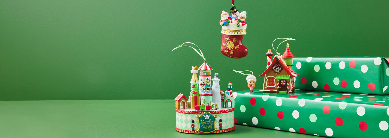Four ornaments and two wrapped packages