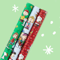 Holiday gift wrap with Peanuts designs. 