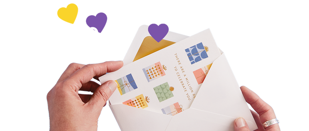 Hands taking a card out of an envelope with yellow, purple and white illustrated hearts popping out too.