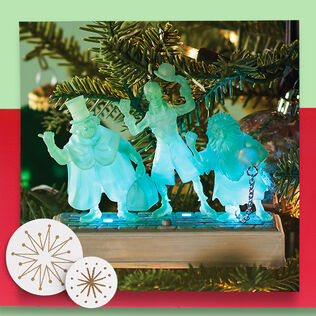 Haunted Mansion Hitchhiking Ghosts Ornament hanging on tree image number 2 Haunted Mansion Hitchhiking Ghosts Ornament in use image number 3 Haunted Mansion Hitchhiking Ghosts Ornament  image number 4 Haunted Mansion Hitchhiking Ghosts Ornament  image number 5 Haunted Mansion Hitchhiking Ghosts Ornament closeup view image number 6 Haunted Mansion Hitchhiking Ghosts Ornament back image number 7 Haunted Mansion Hitchhiking Ghosts Ornament package front image number 8 Haunted Mansion Hitchhiking Ghosts Ornament package back image number 9 Disney The Haunted Mansion Collection The Hitchhiking Ghosts Ornament With Light and Sound