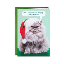 Greeting card with photo of an unhappy fluffy gray cat in a Santa hat