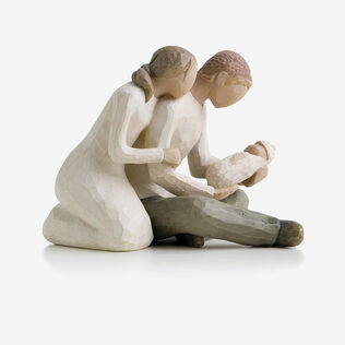 Willow Tree couple holding baby figurine.