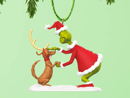 Ornament featuring the Grinch dressed as Santa with Max the dog dressed as a reindeer