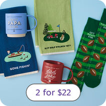Mugs, tea towels, and socks with Fathers Day patterns