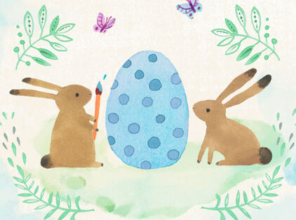 Watercolor rabbits painting a large Easter egg.