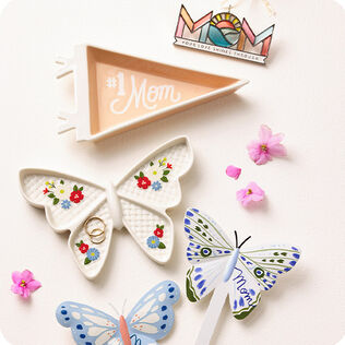 Mom ornament and trinket tray, and butterfly tray and garden stakes.