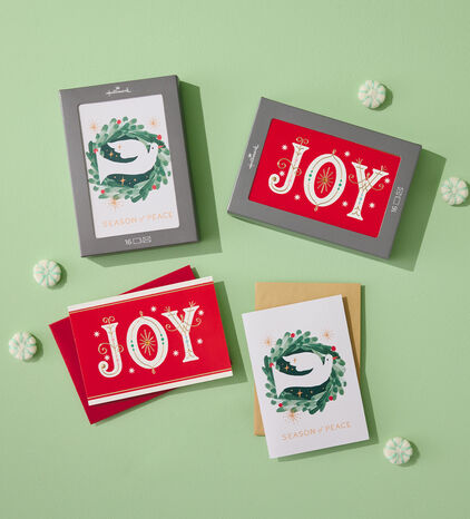Boxed cards featuring joy and a peace dove. 