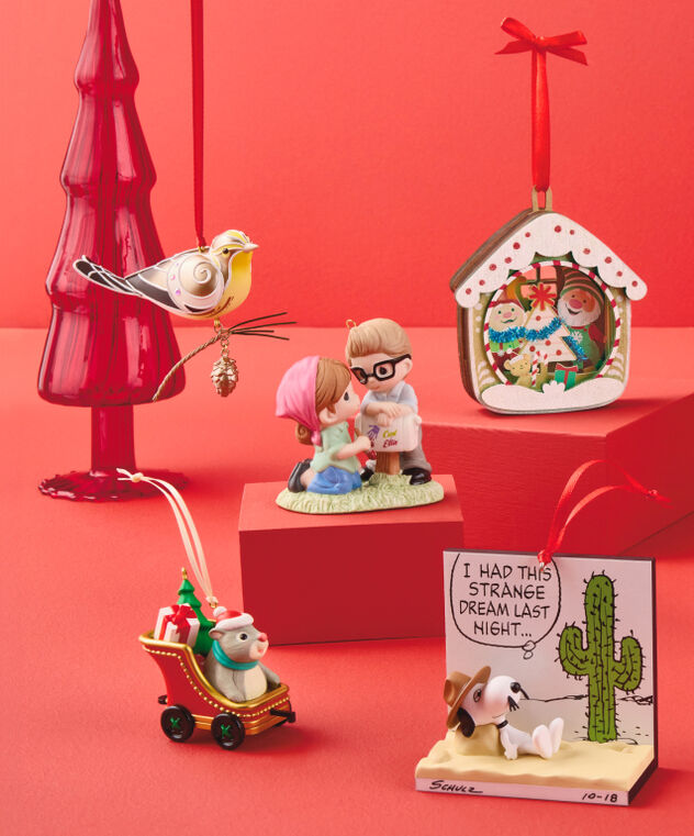 Five limited-quantity ornaments on a red background