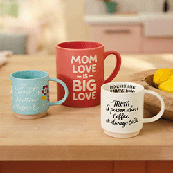 An assortment of motherhood-themed mugs on a kitchen table