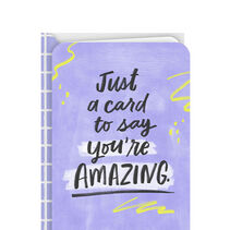 Purple color-washed Youre Amazing card embellished with bright yellow doodles and dots and embossed accents.