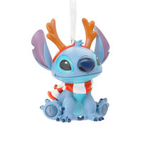 Disney Stitch ornament wearing reindeer antlers and a scarf