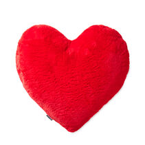 Red and plush heart shaped pillow