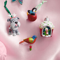 Howliday Helpers, Playful Penguins, Beauty of Birds, and A World Within ornaments