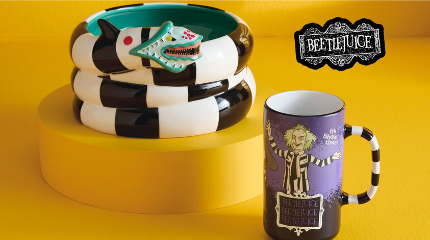 Sand serpent bowl and purple Beetlejuice mug with striped handle