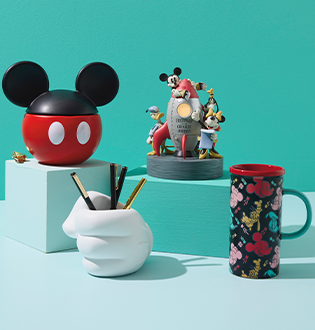 assorted Mickey Mouse products, including a rocketship figurine, a pencil holder, a cup and a container