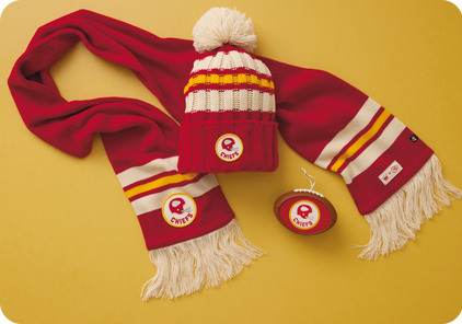 A Chiefs ornament, scarf and beanie hat.