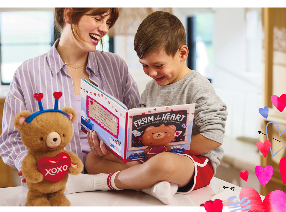 Mom and son reading From the Heart' book with matching dancing bear.