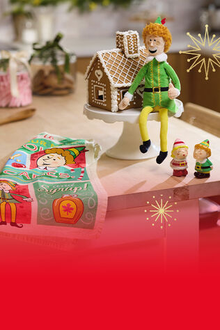 Buddy the elf stuffed doll, blanket, and ornaments.