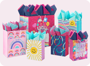 Different gift wrap with a colorful theme.