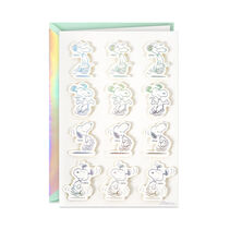 Card with 12 images of a dancing Snoopy