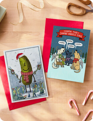 Two funny Christmas cards with red envelopes
