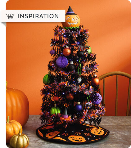Black tree decorated with ornaments