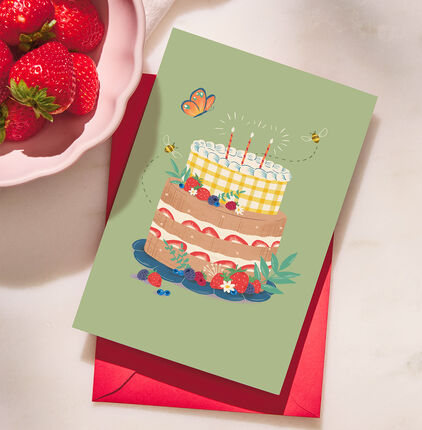 Fruit-filled birthday cake card with red envelope.