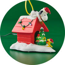 Snoopy on dog house decorated for christmas